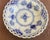 Discontinued item features iconic hand painted floral motif and open work pierced border. Designed as a butter pat dish...