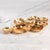 The Cluster of Twelve Gold Serving Bowls Elevate your hosting game with this stunning cluster of serving bowls — the...