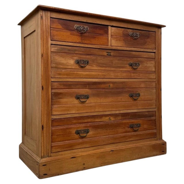 A characterful early 20th-century English chest of drawers, finely crafted from satinwood and distinguished by its...