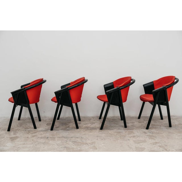A refined and iconic dining set consisting of four original 1970s armchairs, born from the historic collaboration of the...