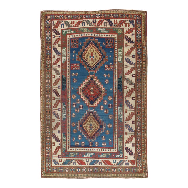 Antique Kazak Handmade Wool Rust, Ivory, Navy, Light Blue & Gold Rug For Sale