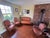 Handsome 4-piece French Louis XVI–style leather seating set, comprising a settee and three matching armchairs, upholstered...