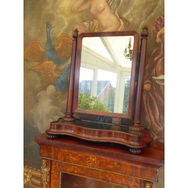 An elegant late 18th-century George III dressing table mirror, dating from circa 1780–1800 and crafted from richly figured...