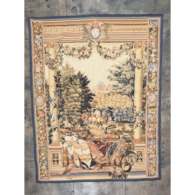 This beautifully detailed vintage tapestry, dating to circa 2000, features an elaborate French classical composition...