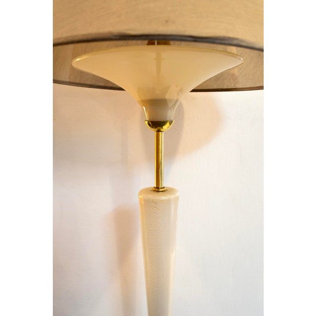 Floor lamp with glass structure, brass base and details, and fabric shade. Designer attributed to Tomaso Buzzi Made in...