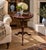 A handsome Georgian-style drinks table crafted in rich mahogany and finished with a beautifully embossed burgundy leather...