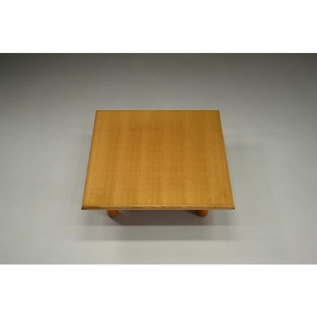 Minimalist square ash wood coffee table, 1980s europe. Square coffee table with rounded edges and cylindrical legs....