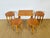 Stunning set of vintage scandinavian nesting coffee tables, comprising a large rectangular table and four small round...