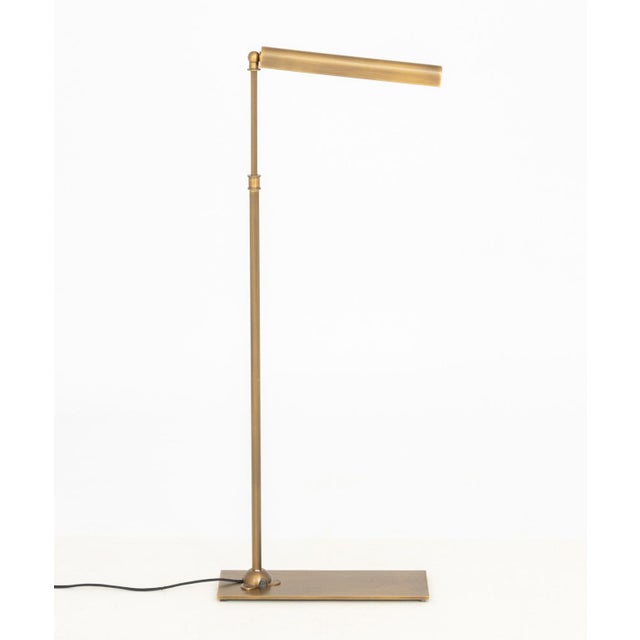 Contemporary Brushed Brass Adjustable Floor Lamp, with half dome shade and rectangular base. Shortest height: 32" H x 17"...
