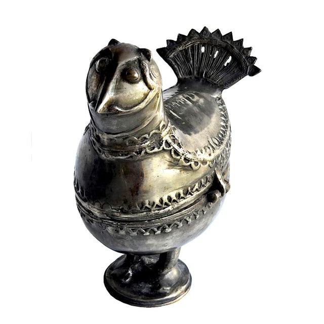 Offered is a vintage Indian Dhokra lidded trinket box made of bronze and pewter. These typically show intricate artisan...