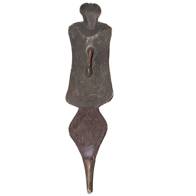 This stunningly large and sophisticated Songye Kifwebe Shield Mask from the Democratic Republic of Congo features a female...