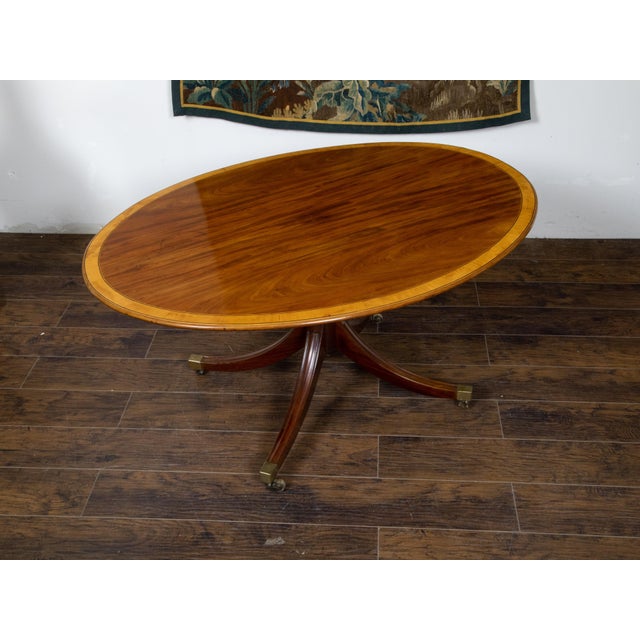 English Mahogany 1840s Oval Top Pedestal Table with Quadripod Base and Casters For Sale - Image 11 of 12