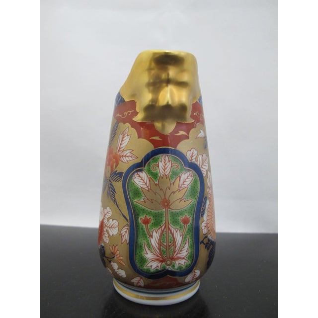 Japanese Arita ware Imari creamer pitcher with a Gokunishiki Kinsai Koimari style design produced by Kisen Kiln in the...