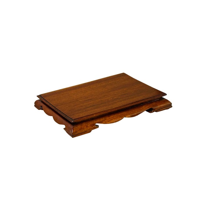 Present your items with understated elegance using the light Brown Wood Simple Flair Legs Rectangular Display Stand Riser...