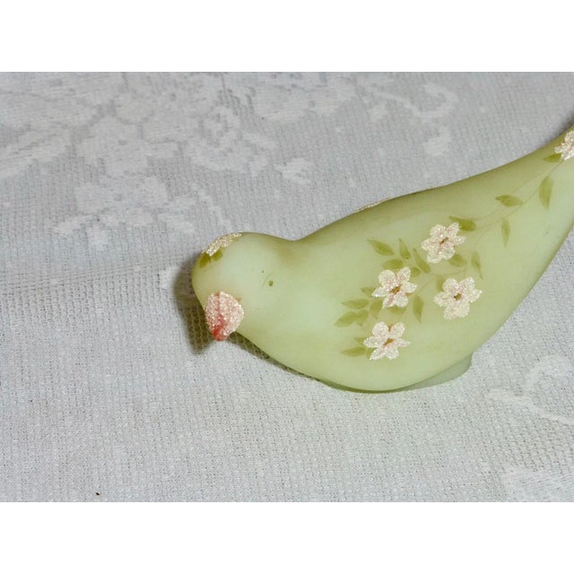 A classically beautiful Fenton figurine in lovely condition, hand-painted and signed by renowned Fenton artist, B....