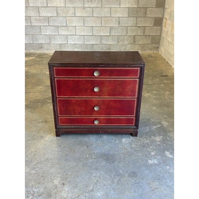 Wonderful leather clad hand tooled chest of drawers with mahogany case. Great color and nice details with hardware- in...