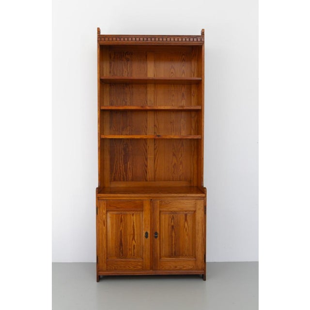 Antique Oregon Pine Bookcase by Martin Nyrop for Rud Rasmussen, Denmark 1905. Tall and impressive Danish bookcase with...