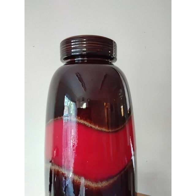West German Scheurich vase. Brown / Red in colour. Marked underneath with the model number 553 - 38. Beautiful smooth...
