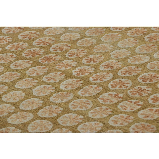 Hand-knotted in wool and silk, this 8x10 rug design is a bold addition to the Block Print line of Rug & Kilim’s Modern...