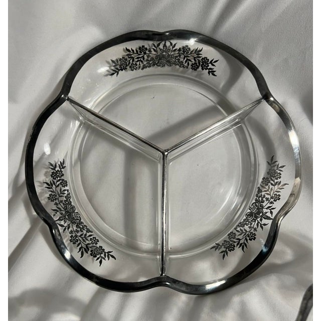 Beautiful Silver City Glass Company serving pieces featuring various patterns. The Silver City Glass Company, based in...