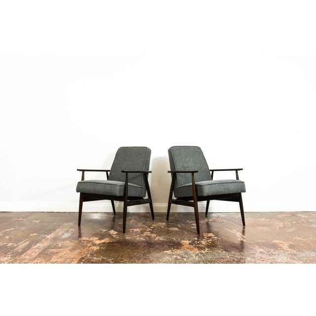 A pair of armchairs, model 300-190, designed by Henryk Lis in the 1960s, was produced by the Dolnośląska Fabryka Mebli,...