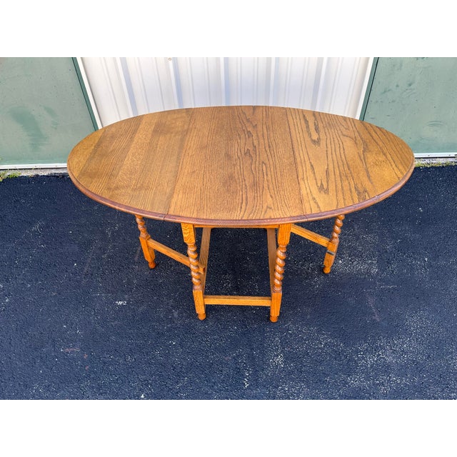 Early 1900's English Oak Barley Twist Oval Gate Leg Table For Sale - Image 12 of 12
