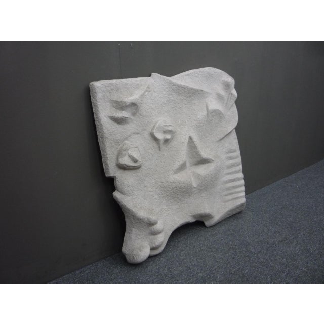 Monumental and Decorative Anthroposophic Wall Art made of cast cement and reinforced with metal rods. There are metal...