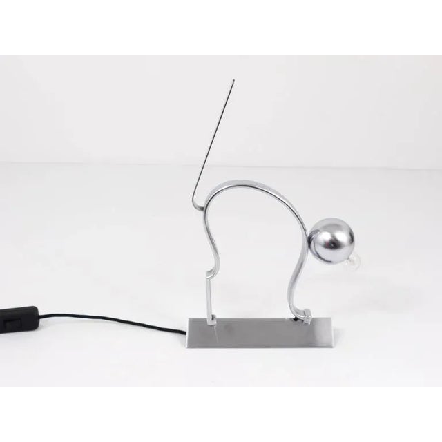 A unique Art Deco table lamp in the shape of a cat in the manner of Werkstatte Hagenauer. Made in the 1930s in...