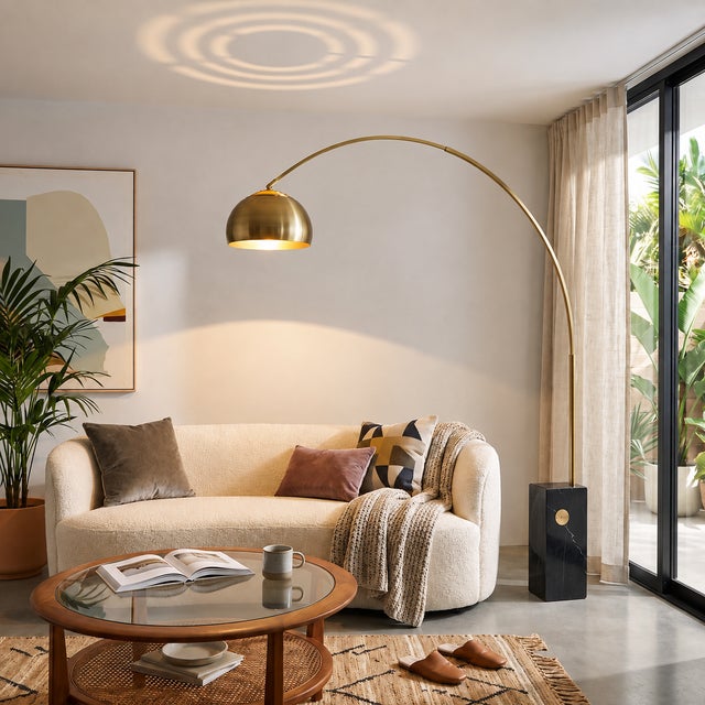 The Iconic Arc Lamp is a Mid-Century Modern masterpiece, featuring a sweeping form with a weathered brass steel body and a...