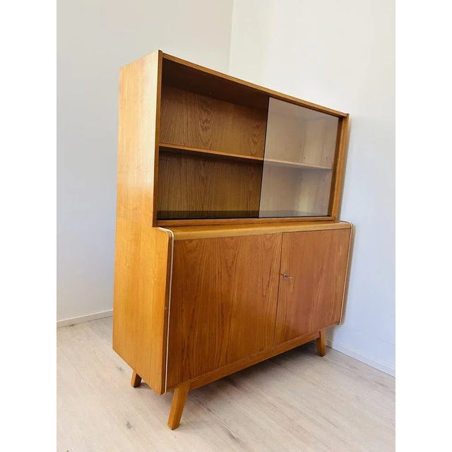 Sideboard by Bohumil Landsman & Hubert Nepozitek for Jitona, 1960s, in Restored conditions. Designed 1960 to 1969 I have...