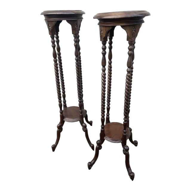 Early 20th Century Victorian Carved Mahogany or Walnut Plant Pedestal Stands Display Columns Torchieres With Turned Legs, a Pair For Sale