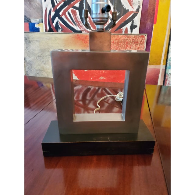 A circa 1970 mid century modern pair of cubist chrome lamps. In all original condition (even the cube finials are correct,...