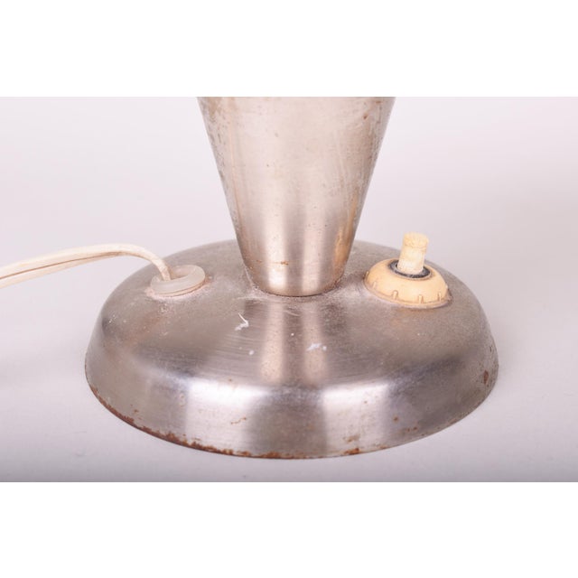 Designer: Josef Hůrka Maker: Napako Model: N 11 This iconic table lamp is a significant piece of Czechoslovak design from...