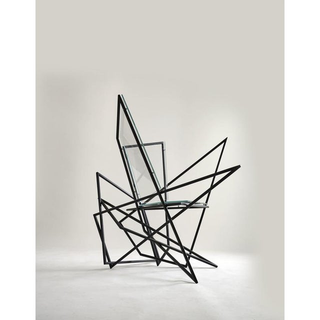 Sitting bull chair, stainless steel and clear glass and by orfeo studio dimensions: w 110 x d 110 x h 110 cm. Material:...