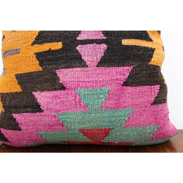 This Turkish pillow cover is made from the highest quality vintage Kilim in 100% wool on the front. The back is covered in...