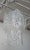 This gorgeous Italian Murano Mazzega chandelier has 15 white pretzel form fused glass pendants hanging to create an...