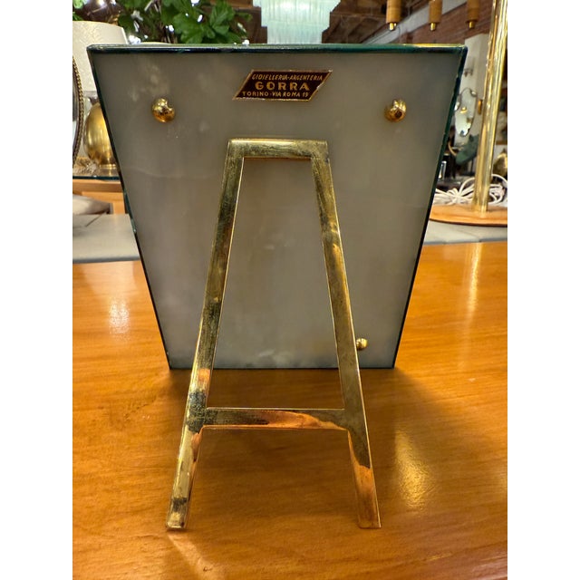 Elegant Italian photo frame produced by Gorra, the historic gioielleria and argenteria based in Turin, as indicated by the...