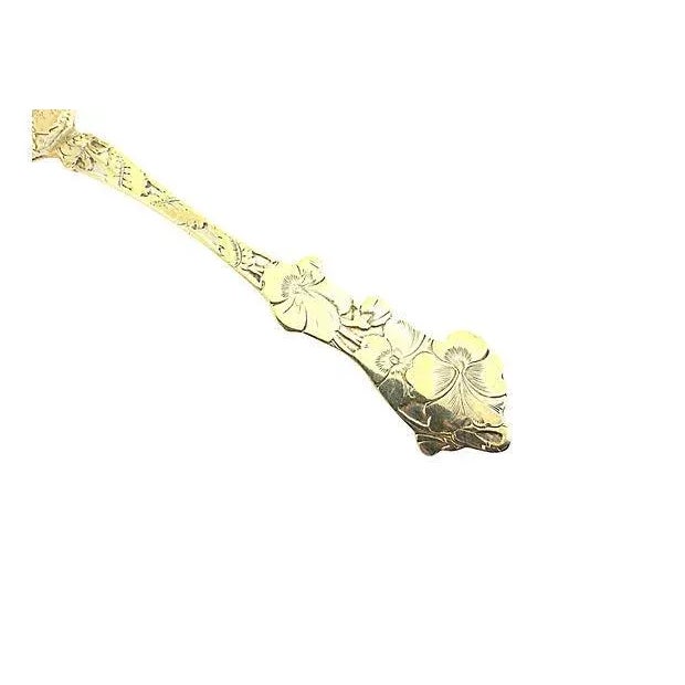 Paye & Baker gold-washed sterling silver confection or nut spoon acid-etched with pansies. Hallmarked "Sterling" along...