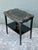 This exquisite Chinoiserie side table is a masterful example of mid-century decorative art, showcasing the celebrated...
