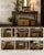 This exquisite antique brass coal scuttle box, dating to the 1920s, is a remarkable example of English craftsmanship,...
