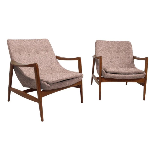 Mid-Century Modern lounge chairs in the style of Ib Kofod-Larsen. Stunning lounge chairs, mid-century style at its finest!...