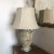 Ceramic urn shaped lamp with handles featuring a yellow crackle finish and 16 inch linen shade.