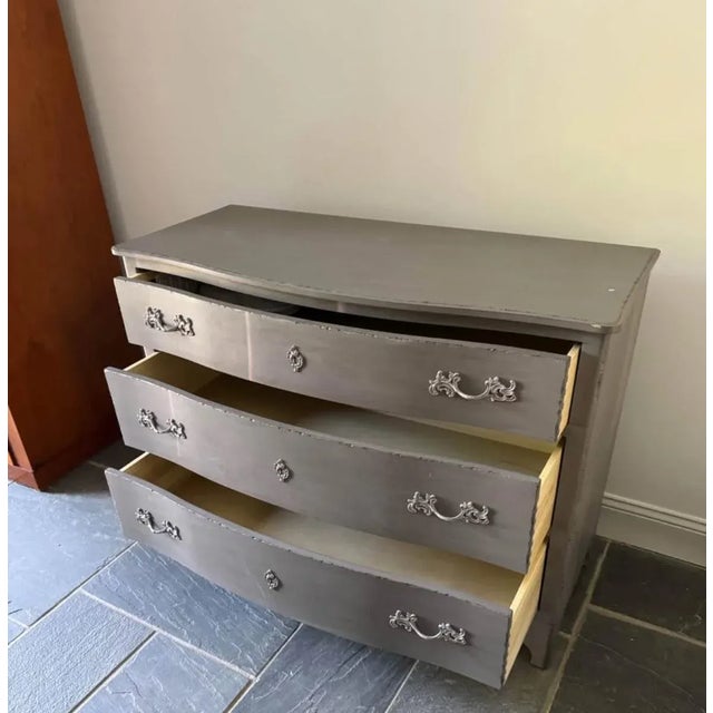 This graceful collection borrows its design from an 18th-century dresser from Sweden, styled with bowfront drawers and...