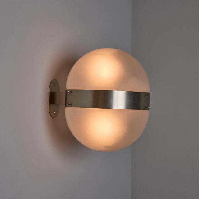 1960s Sergio Mazza 'Clio' Opaline Glass and Nickel Sconce for Artemide Executed in nickeled brass and opaline glass in...