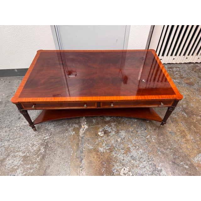 Design Plus Gallery presents the Large Coffee Table by Niagara Furniture. This rectangular coffee table showcases a glossy...