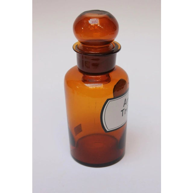 'Amyl. Tritici' (Amylum Tritici) pharmacy bottle/apothecary jar (circa late 1920s/early 1930s, Germany). Amber glass with...