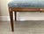 King Louis XVI style bench. Light blue velvet cushion with gold leaf detail.