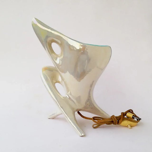 A beautiful, abstract, celestial-style, ceramic lamp. Up to 250V (Europe/UK Standard).The wiring of this item may be...