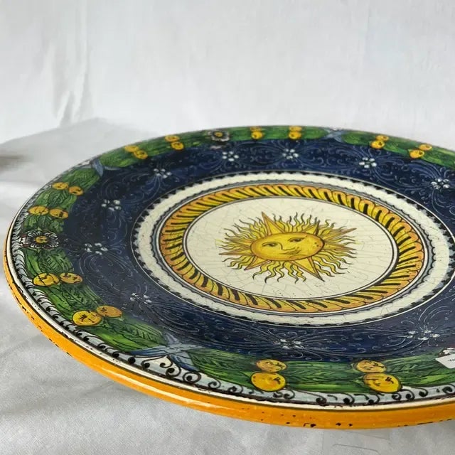 Hand-Painted Blue and Green Ceramic Round Sun Center Wall Plate - Artisan Elegance for Timeless Wall Decor. Created in...