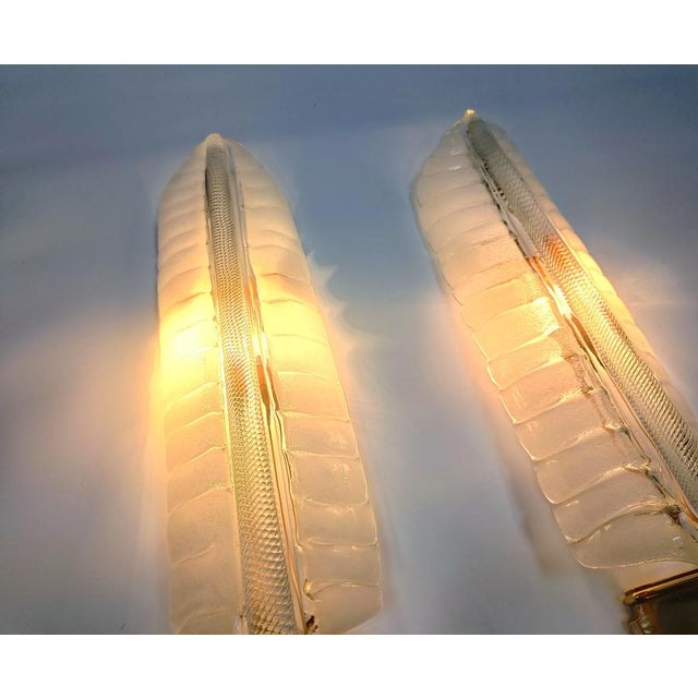 Pair of crystal 'feather' wall lamps by André Arbus & Veronese, hand made with brass glass holders. The glass work is...